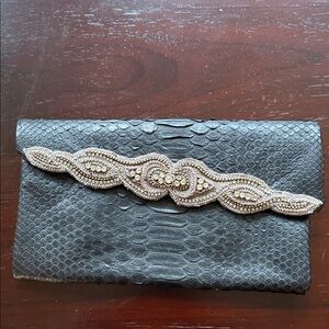 Chic Black Textured Clutch with Beaded Detail